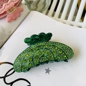 Elegant emerald green rhinestone hair claw clip with crystal acetate finish for women