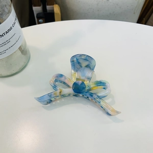 Elegant acetate bow hair claw clip with blue marble pattern for women hairstyle