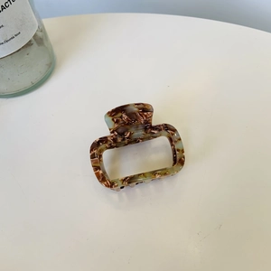 French acetate hair claw clip with tortoiseshell texture and hollow square design