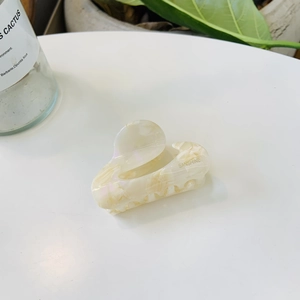 Elegant marble white acetate hair claw clip with glossy finish for high ponytail styling