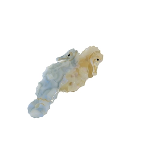 Marine acetate hair claw clip featuring a two-tone sea horse design with pearl finish