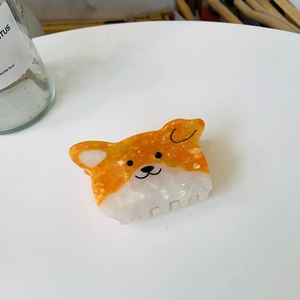 Pince à cheveux motif petit chien corgi en acétate marbré orange et blanc