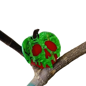 Halloween acetate hair claw clip featuring a green marble poison apple with a red skull design