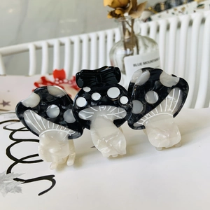 Cute mushroom-shaped acetate hair claw clips with various polka dot patterns