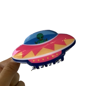 Cartoon UFO alien acrylic hair claw clip in vibrant colors for trendy hairstyles