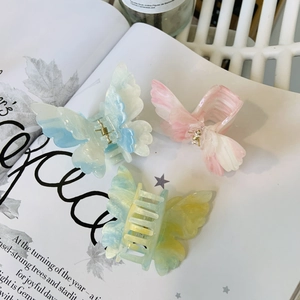 Fairy butterfly hair claws set in colorful acrylic with pearlescent finish for women