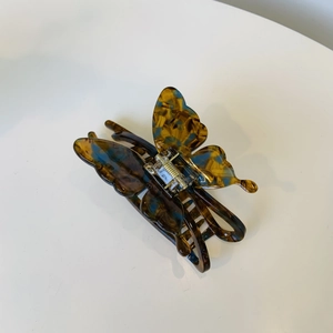 Pince à cheveux papillon élégante en acétate avec motifs écaillés bleu et brun