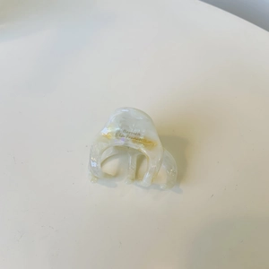 Elegant marble pattern acetate hair claw clip with gold Barrette la France logo engraving