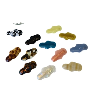 Set of minimalist irregular tortoiseshell acetate hair clips in various marble patterns