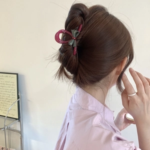 Elegant medium bow hair claw clip in dark pink and grey acetate for half-up hairstyles