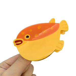 Pince à cheveux motif poisson-globe jaune et orange en fibre d'acétate de qualité
