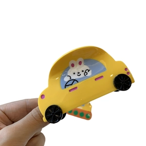 Pince à cheveux mignonne en forme d'excavatrice jaune avec design de lapin conducteur