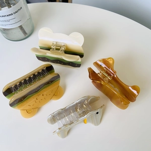 Lot de quatre pinces à cheveux en acétate avec motifs de burgers, ours et chiens pour femmes