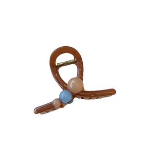 Elegant brown acrylic shark hair claw clip with colorful beads and gold metal spring