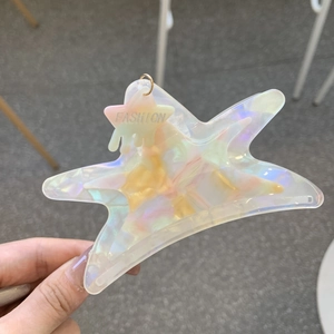 Pentagram acetate hair claw clip with colorful pearlescent finish and star pendant