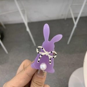Fermaglio per capelli a coniglio in acetato viola con fiocco a pois e perla