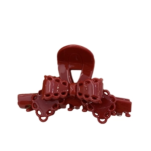 Elegant deep red acetate bow hair claw clip with heart patterns for women's autumn style