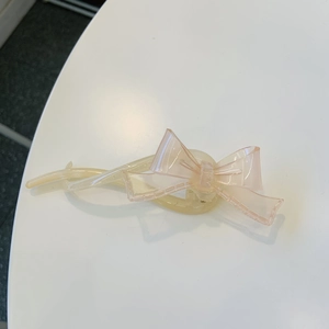 Pince à cheveux élégante avec nœud papillon en acrylique translucide rose