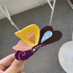 Eleganter Schmetterlings-Haarclip aus Acetat mit glitzernden Strasssteinen und bunten Mustern