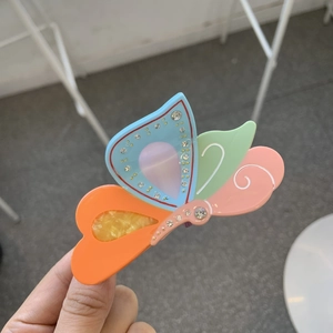 Eleganter Schmetterlings-Haarclip aus Acetat mit bunten Strasssteinen für Damen