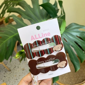 Barrettes à cheveux à rayures brunes avec illustrations de chiens en lot de deux
