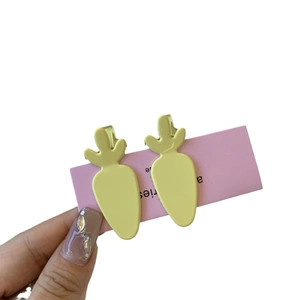 Chic carrot shaped hair clips in creamy yellow glaze finish for girls hair styling