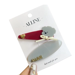 Chic two-piece hair clip set featuring burgundy dog motif and grey Alline letter hairpin