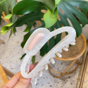 Hollow acetate shark hair clip with white marble pattern and pink rabbit ears