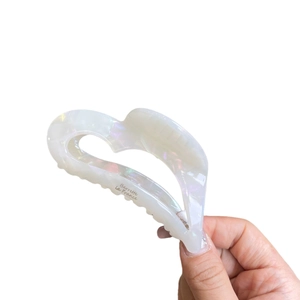 Iridescent heart-shaped acetate hair claw clip with Barrette La France engraving