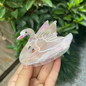 Swan shaped acetate hair claw clip with pearlescent pink finish for women hair styling