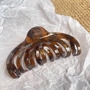 Elegant tortoiseshell acetate large hair claw clip for thick hair in minimalist style