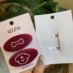 Burgundy knitted hair clips set with cute dog and bone embroidery for women