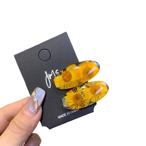 Zweiteiliges Set transparente Harz-Haarklammern mit echten gelben getrockneten Sonnenblumen