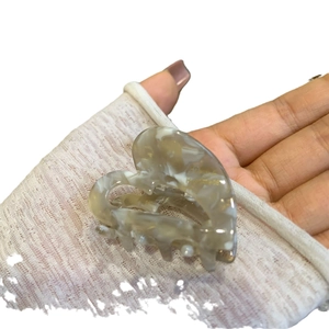 Elegant heart-shaped acetic acid hair claw clip with milk coffee marble texture