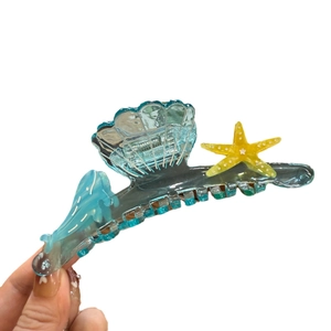 Pince à cheveux élégante en acétate sur le thème de l'océan avec coquillage et étoile