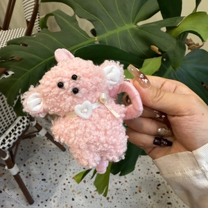 Chic pink plush animal hair claw clip with white heart detail for elegant updos