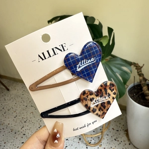 Chic heart-shaped hair clips set with blue checkerboard and leopard print patterns