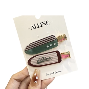 Vintage checkered hair clips set with sparkling rhinestones in dark green and red colors