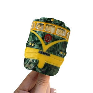 Retro bus hair claw clip in dark green marbled acetate with yellow detail and car plate