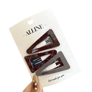 Three-piece set of triangle hair clips in solid red, grey, and classic plaid patterns