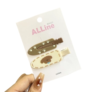 Lot de jolies barrettes à cheveux ours marron et crème sur carte de présentation