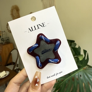 Pince à cheveux étoile avec cordelette tressée bleue et carte de marque Alline