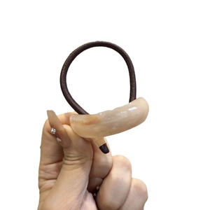 Korean style marble texture resin hair tie with engraved Sanshine logo on brown cord