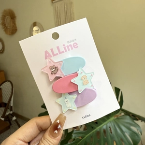 Set of 6 cute star and oval macaron hair clips with cartoon patterns on a card