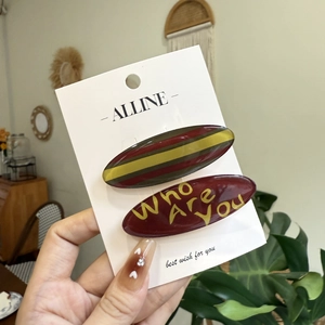 Striped hair clips set for women featuring letters and colorful resin finish