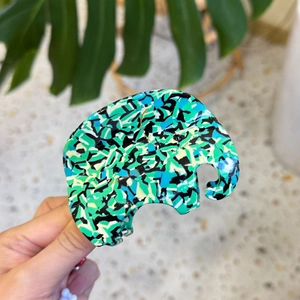 Detail of elephant-shaped hair claw clip with colorful mosaic acetate textures