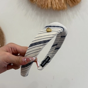 Striped wide headband with heart metal charm and handmade fabric texture for women