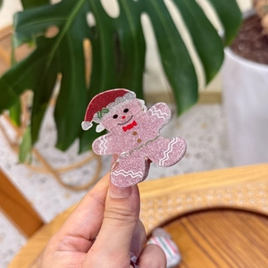Pince à cheveux de Noël bonhomme de pain d'épices rose à paillettes et nœud rouge