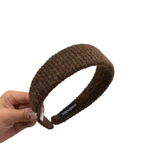 Brown wide ribbed knit headband for women with a handmade label and high crown effect