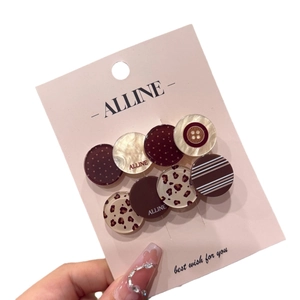 Chic leopard print and marbled resin button hair clips set on branding display card